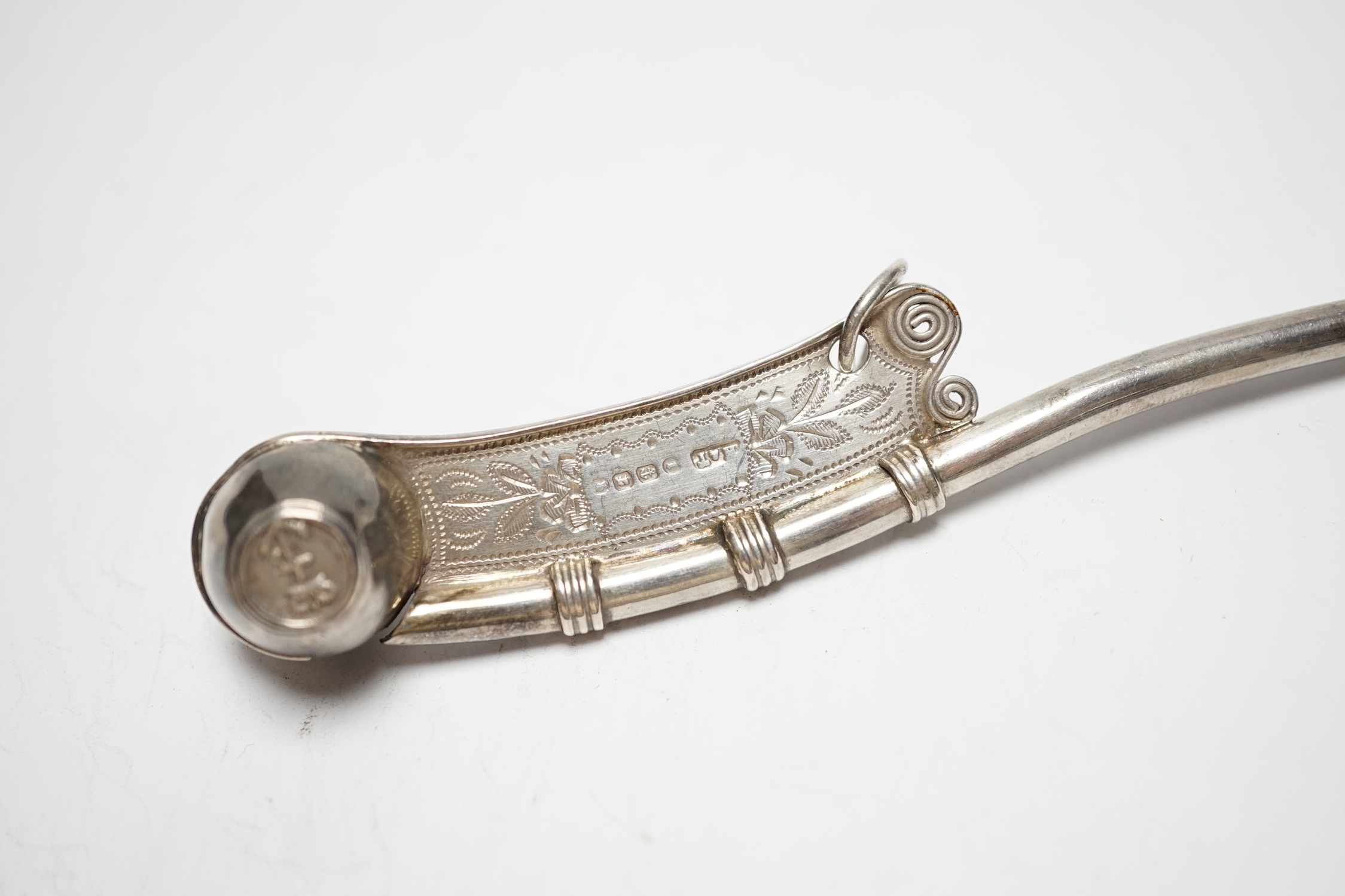 A Victorian engraved silver bosun's call, Hilliard & Thomason, Birmingham, 1883. 11.7cm.